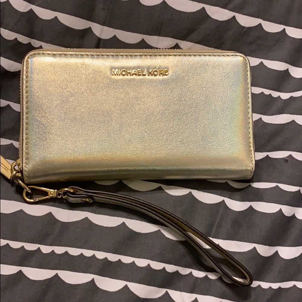 Michael Kors holographic pale gold wristlet